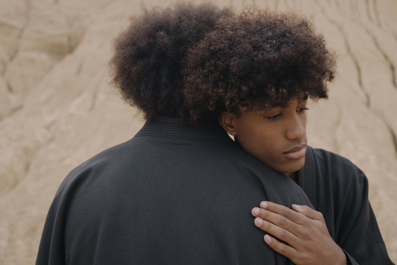 Men hugging each other